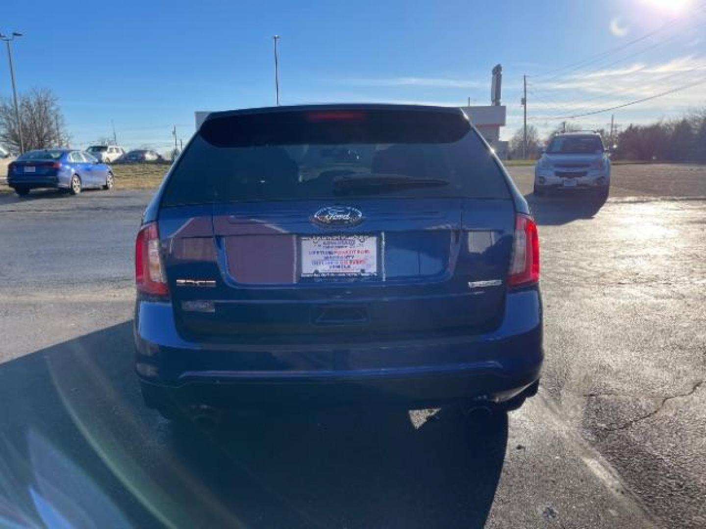 2014 Deep Impact Blue Metallic Ford Edge SE FWD (2FMDK3G93EB) with an 2.0L L4 DOHC 16V engine, 6-Speed Automatic transmission, located at 880 E. National Road, Vandalia, OH, 45377, (937) 908-9800, 39.891918, -84.183594 - Photo#4