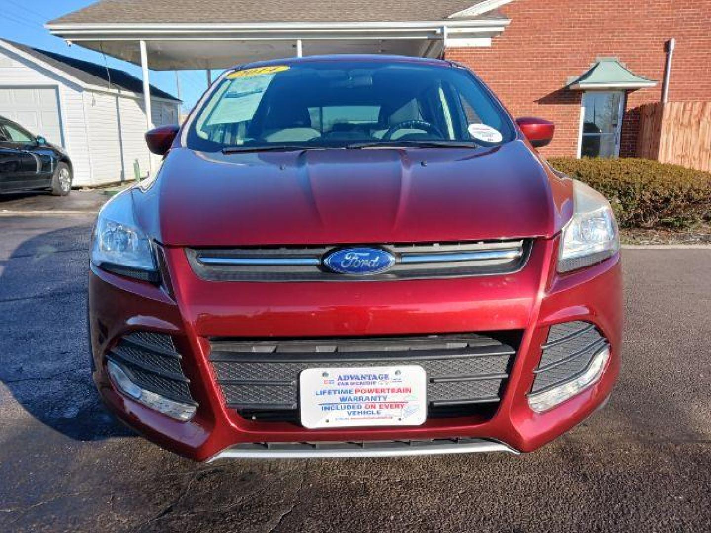 2014 Ruby Red Tinted CC Ford Escape SE FWD (1FMCU0G93EU) with an 2.0L L4 DOHC 16V engine, 6-Speed Automatic transmission, located at 401 Woodman Dr, Riverside, OH, 45431, (937) 908-9800, 39.760899, -84.123421 - Photo#1