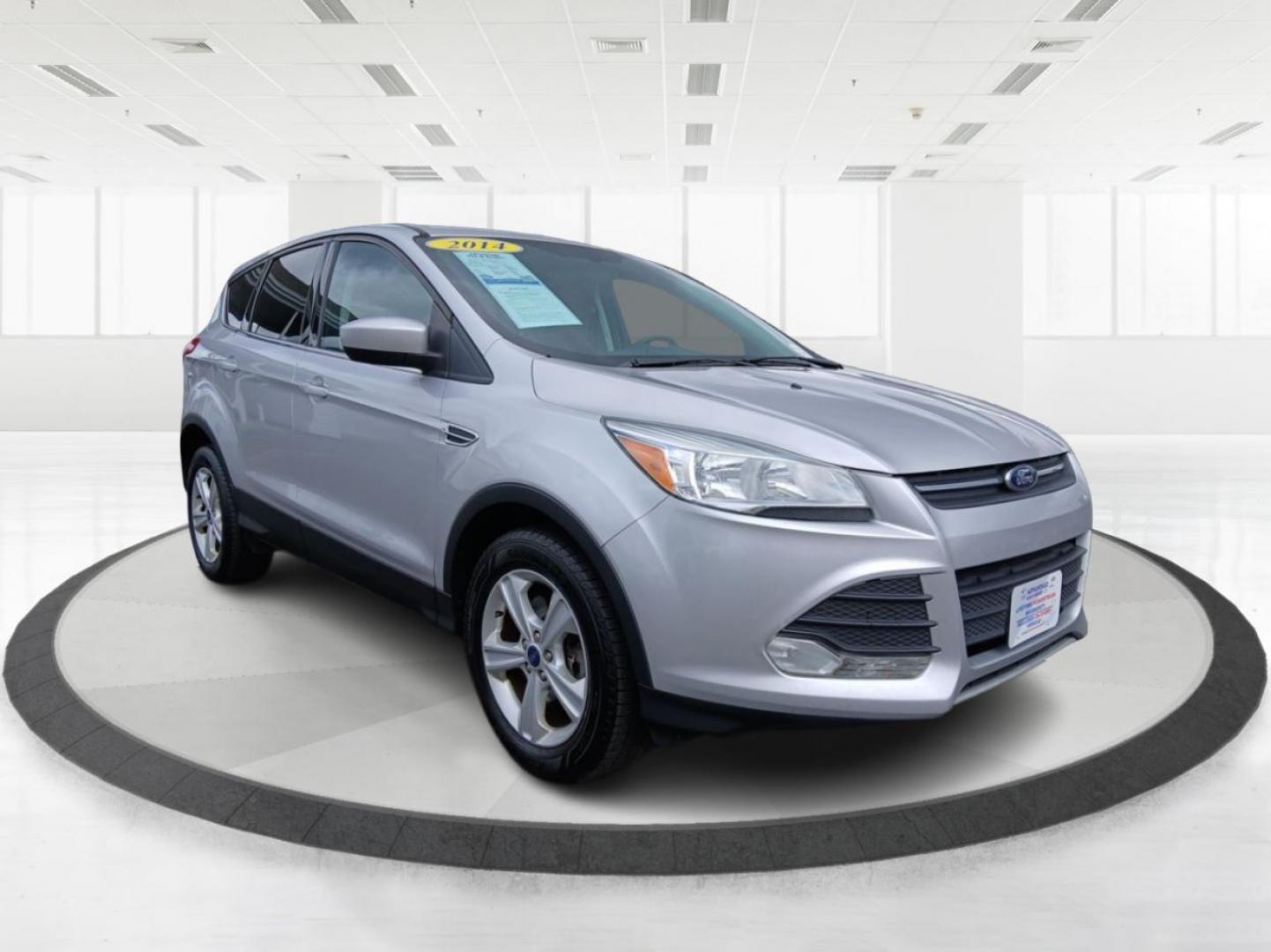 2014 Ingot Silver Metallic Ford Escape SE 4WD (1FMCU9G9XEU) with an 2.0L L4 DOHC 16V engine, 6-Speed Automatic transmission, located at 880 E. National Road, Vandalia, OH, 45377, (937) 908-9800, 39.891918, -84.183594 - Photo#0