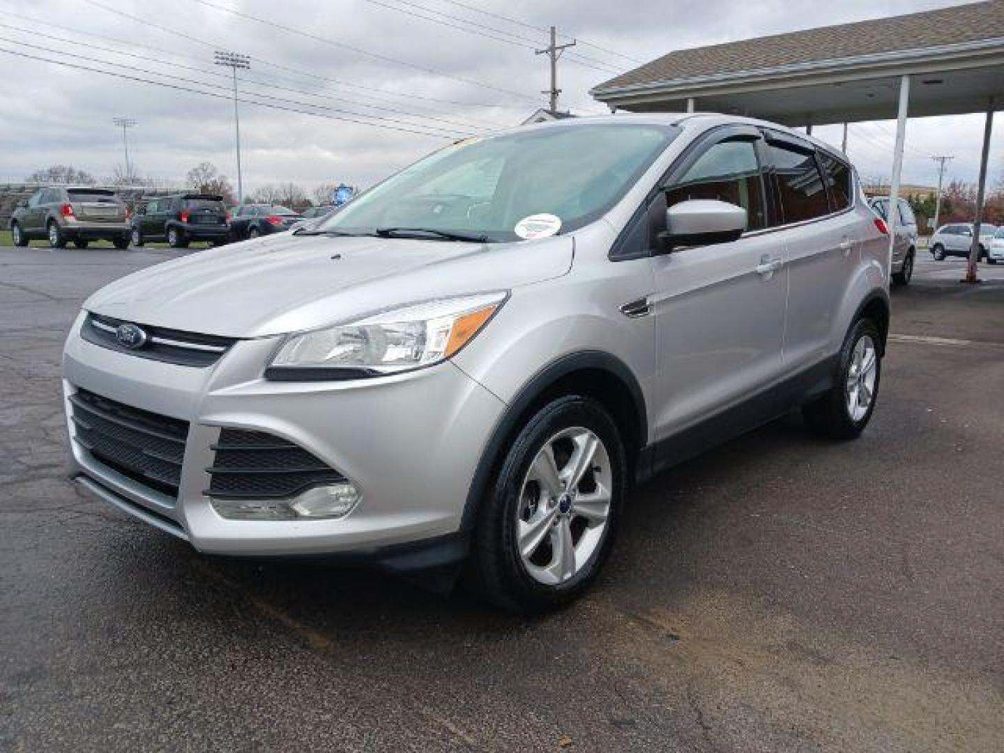 2014 Ingot Silver Metallic Ford Escape SE 4WD (1FMCU9G92EU) with an 2.0L L4 DOHC 16V engine, 6-Speed Automatic transmission, located at 1951 S Dayton Lakeview Rd., New Carlisle, OH, 45344, (937) 908-9800, 39.890999, -84.050255 - Photo#2