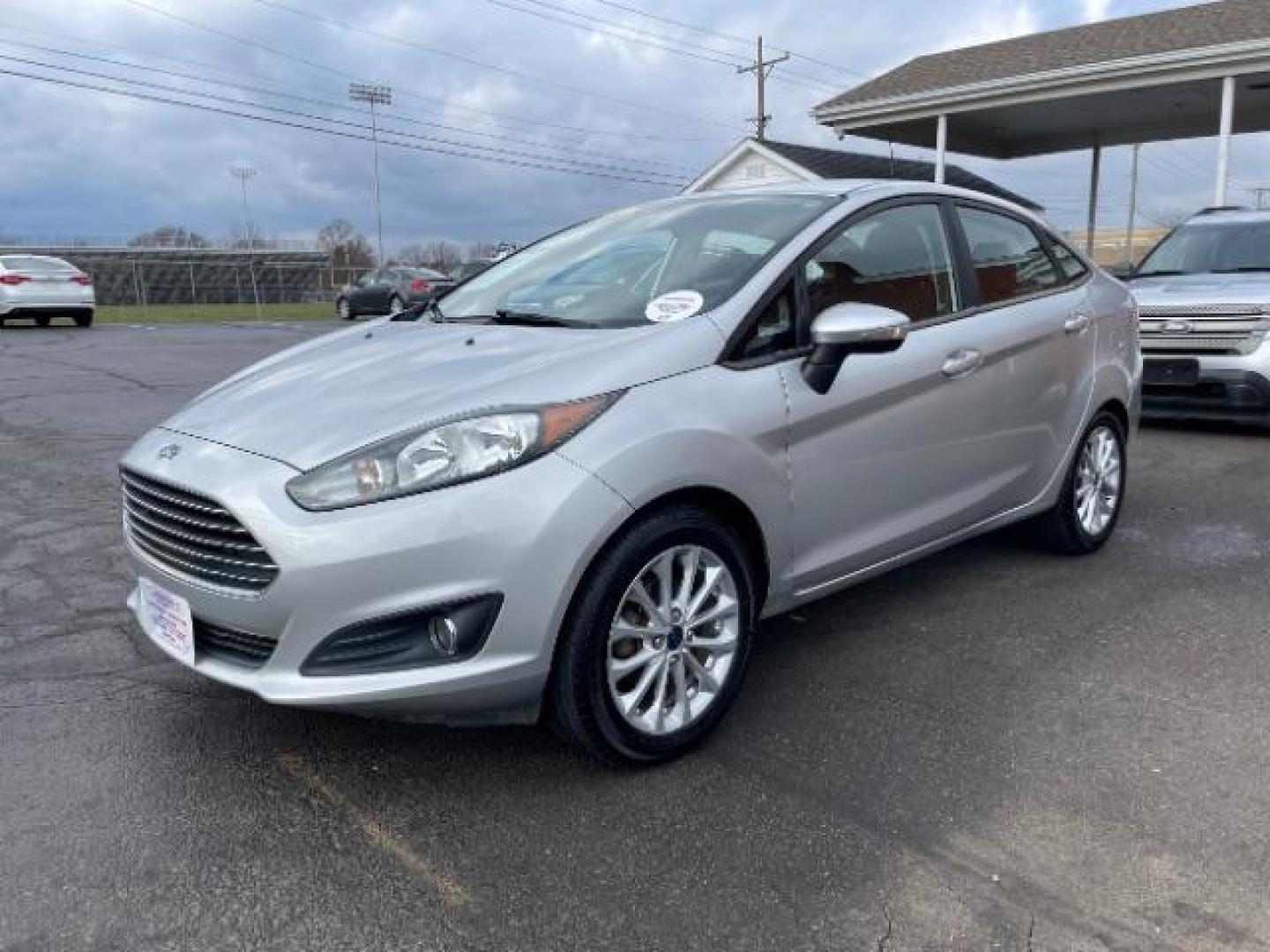 2014 Ingot Silver Metallic Ford Fiesta SE Sedan (3FADP4BJ6EM) with an 1.6L L4 DOHC 16V engine, located at 401 Woodman Dr, Riverside, OH, 45431, (937) 908-9800, 39.760899, -84.123421 - Photo#1