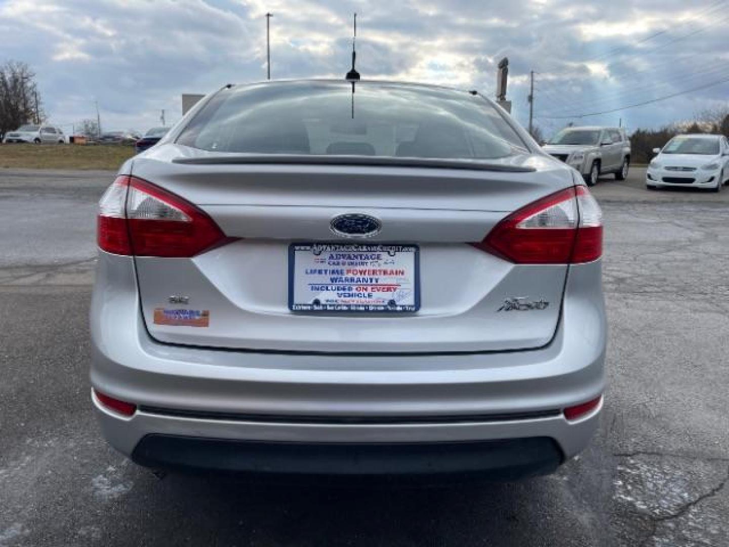 2014 Ingot Silver Metallic Ford Fiesta SE Sedan (3FADP4BJ6EM) with an 1.6L L4 DOHC 16V engine, located at 401 Woodman Dr, Riverside, OH, 45431, (937) 908-9800, 39.760899, -84.123421 - Photo#3