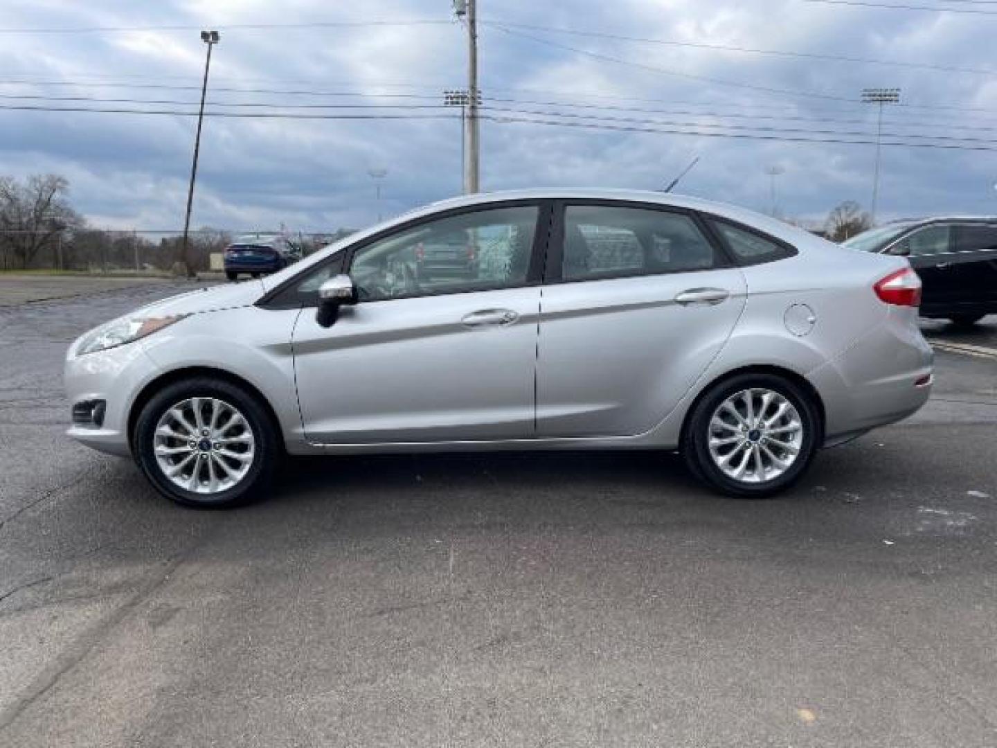 2014 Ingot Silver Metallic Ford Fiesta SE Sedan (3FADP4BJ6EM) with an 1.6L L4 DOHC 16V engine, located at 401 Woodman Dr, Riverside, OH, 45431, (937) 908-9800, 39.760899, -84.123421 - Photo#4