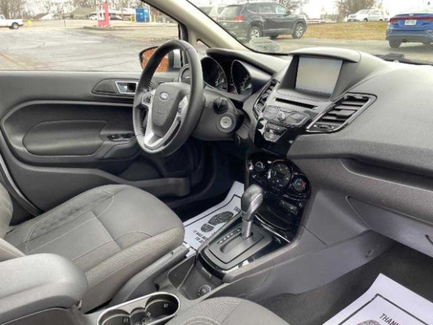 2014 Ingot Silver Metallic Ford Fiesta SE Sedan (3FADP4BJ6EM) with an 1.6L L4 DOHC 16V engine, located at 401 Woodman Dr, Riverside, OH, 45431, (937) 908-9800, 39.760899, -84.123421 - Photo#8