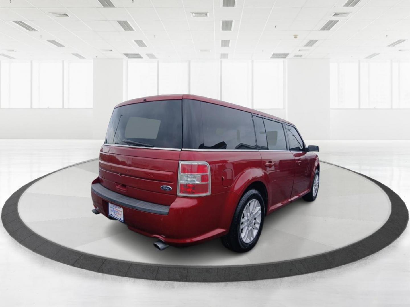 2014 Ruby Red Met Tinted CC Ford Flex SEL FWD (2FMGK5C8XEB) with an 3.5L V6 DOHC 24V engine, 6-Speed Automatic Overdrive transmission, located at 4508 South Dixie Dr, Moraine, OH, 45439, (937) 908-9800, 39.689976, -84.218452 - Photo#2