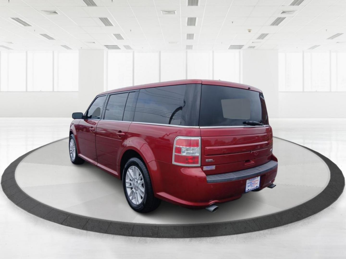 2014 Ruby Red Met Tinted CC Ford Flex SEL FWD (2FMGK5C8XEB) with an 3.5L V6 DOHC 24V engine, 6-Speed Automatic Overdrive transmission, located at 4508 South Dixie Dr, Moraine, OH, 45439, (937) 908-9800, 39.689976, -84.218452 - Photo#4