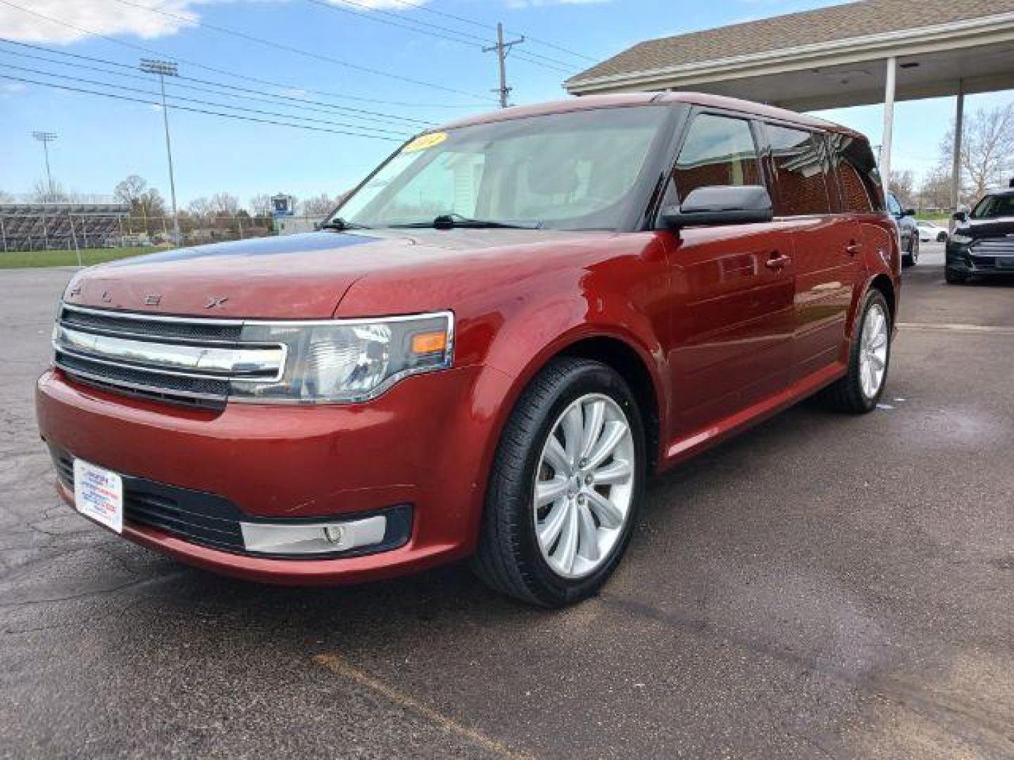 2014 Ruby Red Met Tinted CC Ford Flex SEL AWD (2FMHK6C81EB) with an 3.5L V6 DOHC 24V engine, 6-Speed Automatic Overdrive transmission, located at 1951 S Dayton Lakeview Rd., New Carlisle, OH, 45344, (937) 908-9800, 39.890999, -84.050255 - Photo#2