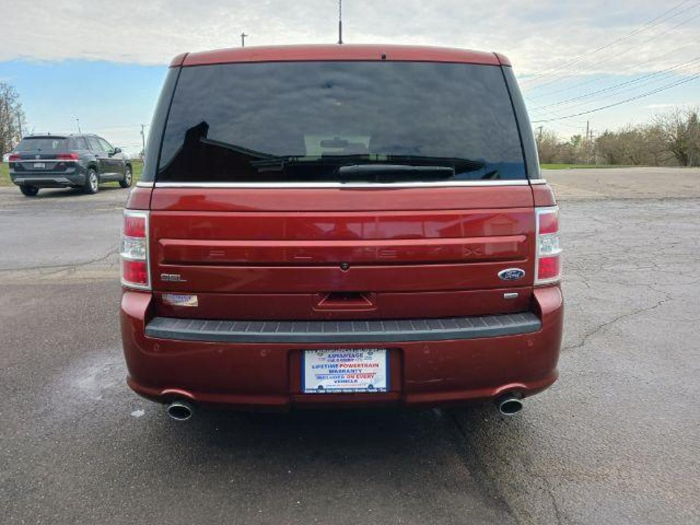 2014 Ruby Red Met Tinted CC Ford Flex SEL AWD (2FMHK6C81EB) with an 3.5L V6 DOHC 24V engine, 6-Speed Automatic Overdrive transmission, located at 1951 S Dayton Lakeview Rd., New Carlisle, OH, 45344, (937) 908-9800, 39.890999, -84.050255 - Photo#5