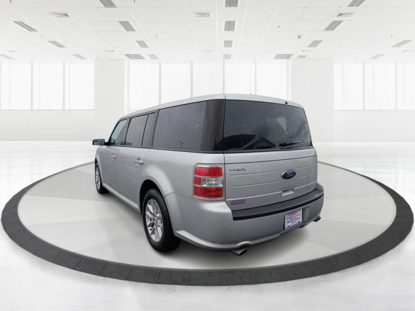 2014 Ford Flex SE FWD (2FMGK5B8XEB) with an 3.5L V6 DOHC 24V engine, 6-Speed Automatic Overdrive transmission, located at 8750 N County Rd 25A, Piqua, OH, 45356, (937) 908-9800, 40.164391, -84.232513 - Third Row - Photo#4