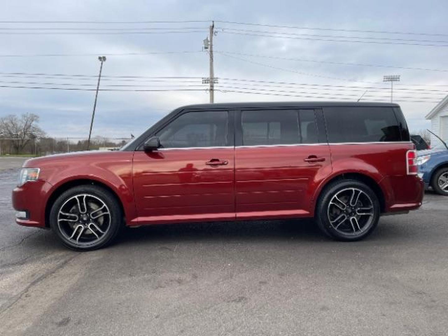 2014 Orange Ford Flex SEL FWD (2FMGK5C89EB) with an 3.5L V6 DOHC 24V engine, 6-Speed Automatic Overdrive transmission, located at 401 Woodman Dr, Riverside, OH, 45431, (937) 908-9800, 39.760899, -84.123421 - Photo#3