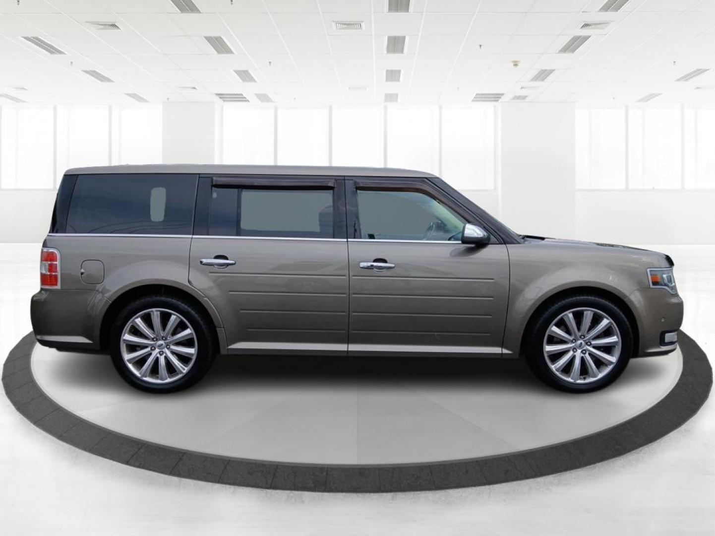 2014 Mineral Gray Metallic Ford Flex Limited AWD w/EcoBoost (2FMHK6DTXEB) with an 3.5L V6 DOHC 24V engine, 6-Speed Automatic Overdrive transmission, located at 401 Woodman Dr, Riverside, OH, 45431, (937) 908-9800, 39.760899, -84.123421 - Photo#1