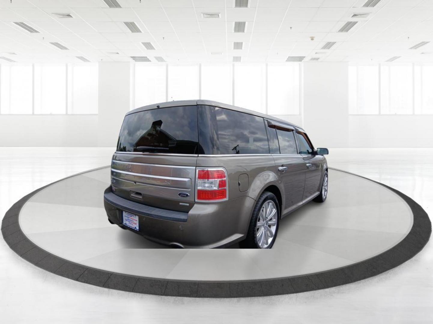 2014 Mineral Gray Metallic Ford Flex Limited AWD w/EcoBoost (2FMHK6DTXEB) with an 3.5L V6 DOHC 24V engine, 6-Speed Automatic Overdrive transmission, located at 401 Woodman Dr, Riverside, OH, 45431, (937) 908-9800, 39.760899, -84.123421 - Photo#2