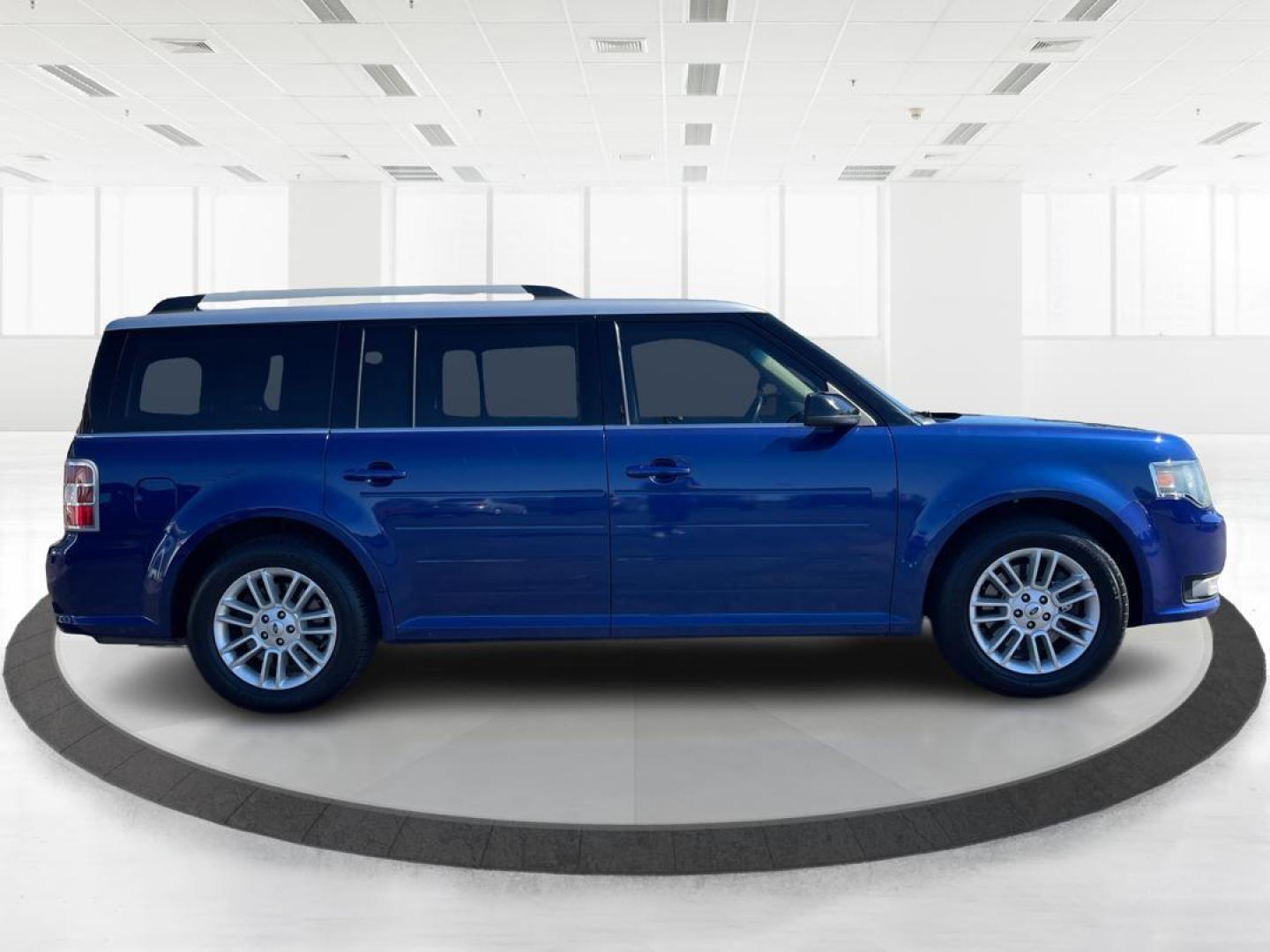 2014 Deep Impact Blue Metallic Ford Flex SEL AWD (2FMHK6C89EB) with an 3.5L V6 DOHC 24V engine, 6-Speed Automatic Overdrive transmission, located at 1099 N County Rd 25A , Troy, OH, 45373, (937) 908-9800, 40.057079, -84.212883 - Photo#1