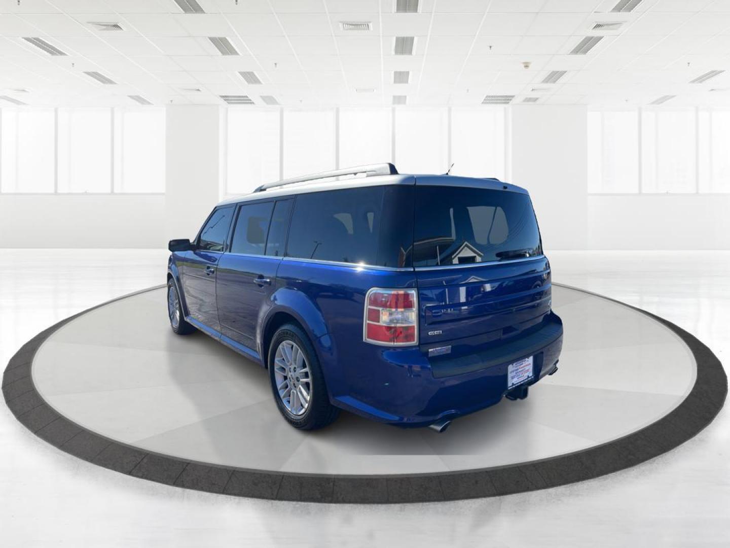 2014 Deep Impact Blue Metallic Ford Flex SEL AWD (2FMHK6C89EB) with an 3.5L V6 DOHC 24V engine, 6-Speed Automatic Overdrive transmission, located at 1099 N County Rd 25A , Troy, OH, 45373, (937) 908-9800, 40.057079, -84.212883 - Photo#4