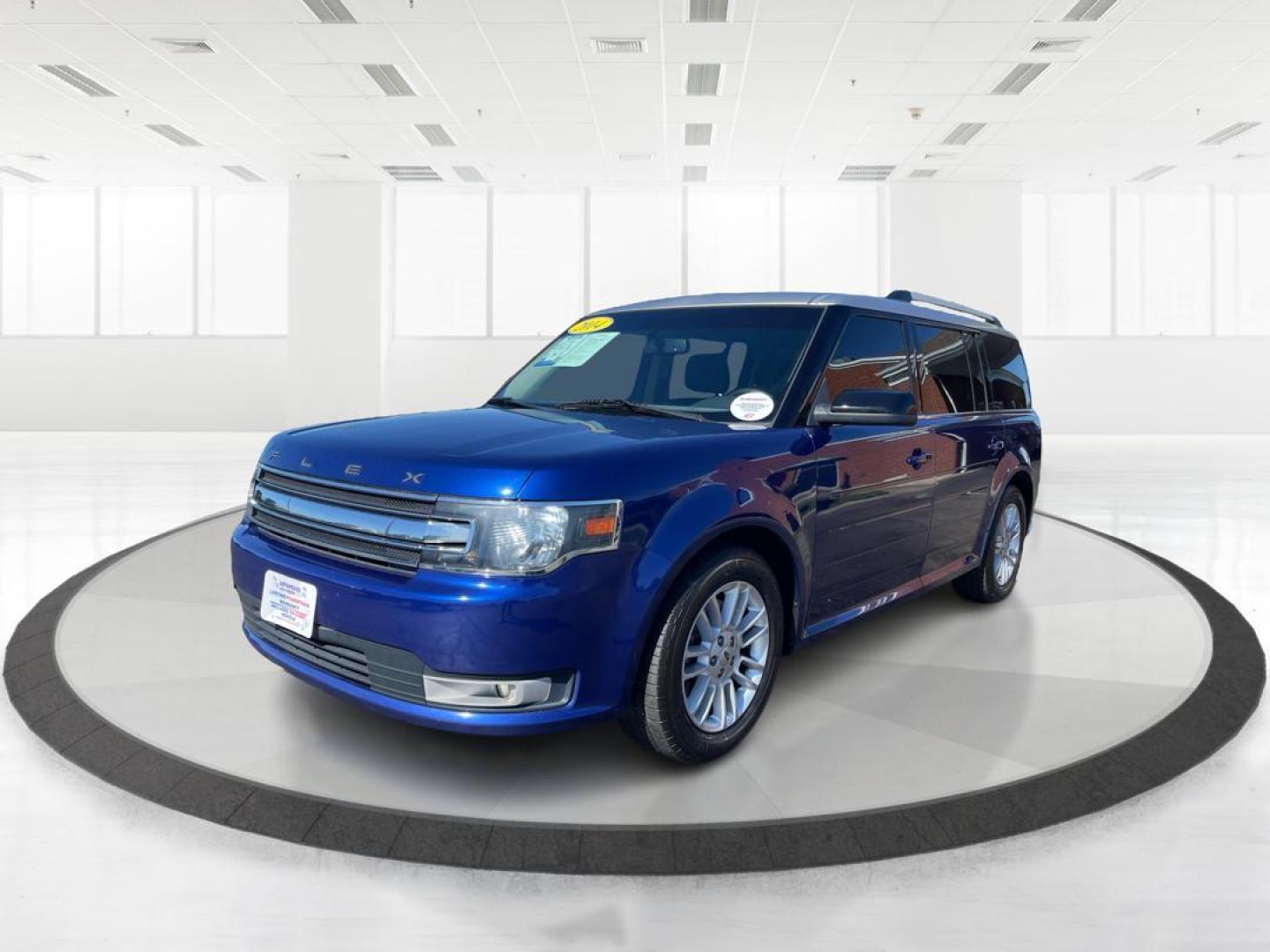 2014 Deep Impact Blue Metallic Ford Flex SEL AWD (2FMHK6C89EB) with an 3.5L V6 DOHC 24V engine, 6-Speed Automatic Overdrive transmission, located at 1099 N County Rd 25A , Troy, OH, 45373, (937) 908-9800, 40.057079, -84.212883 - Photo#7