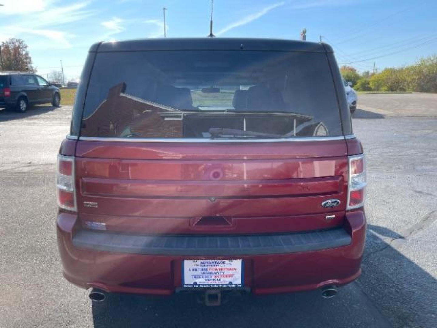 2014 Ruby Red Met Tinted CC Ford Flex SEL AWD (2FMHK6C86EB) with an 3.5L V6 DOHC 24V engine, 6-Speed Automatic Overdrive transmission, located at 4508 South Dixie Dr, Moraine, OH, 45439, (937) 908-9800, 39.689976, -84.218452 - Photo#4