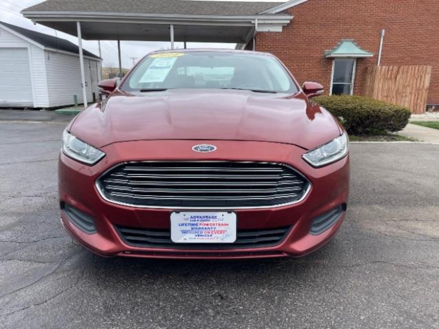 2014 Ruby Red Met Tinted CC Ford Fusion SE (3FA6P0H74ER) with an 2.5L L4 DOHC 16V engine, located at 1099 N County Rd 25A , Troy, OH, 45373, (937) 908-9800, 40.057079, -84.212883 - Photo#4