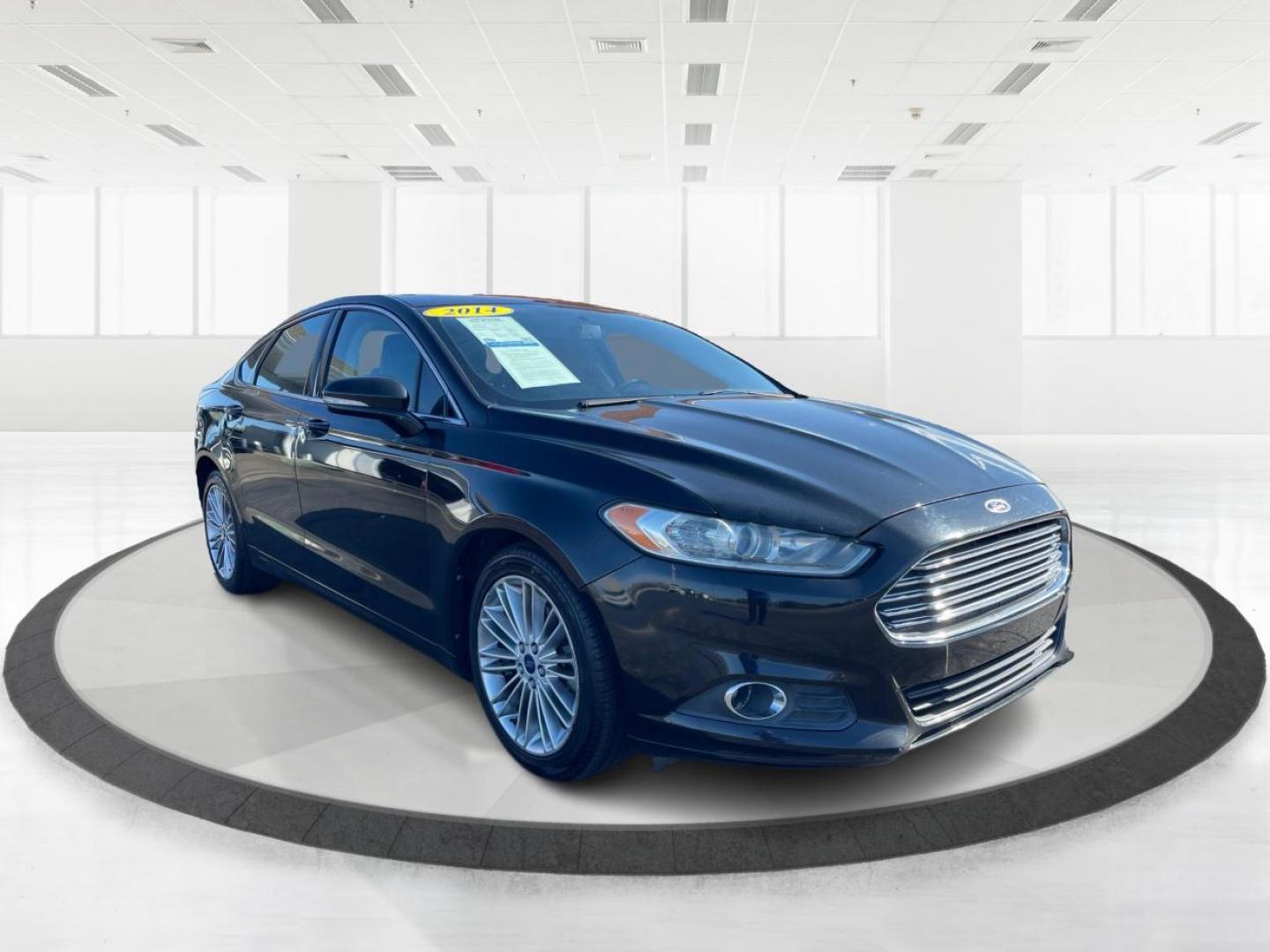 2014 Tuxedo Black Metallic Ford Fusion SE (3FA6P0H93ER) with an 2.0L L4 DOHC 16V engine, located at 1184 Kauffman Ave, Fairborn, OH, 45324, (937) 908-9800, 39.807072, -84.030914 - Photo#0