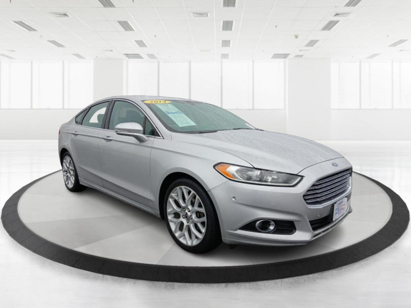 2014 Ford Fusion Titanium AWD (3FA6P0D96ER) with an 2.0L L4 DOHC 16V engine, located at 401 Woodman Dr, Riverside, OH, 45431, (937) 908-9800, 39.760899, -84.123421 - 2014 Ford Fusion Titanium AWD - Photo#0