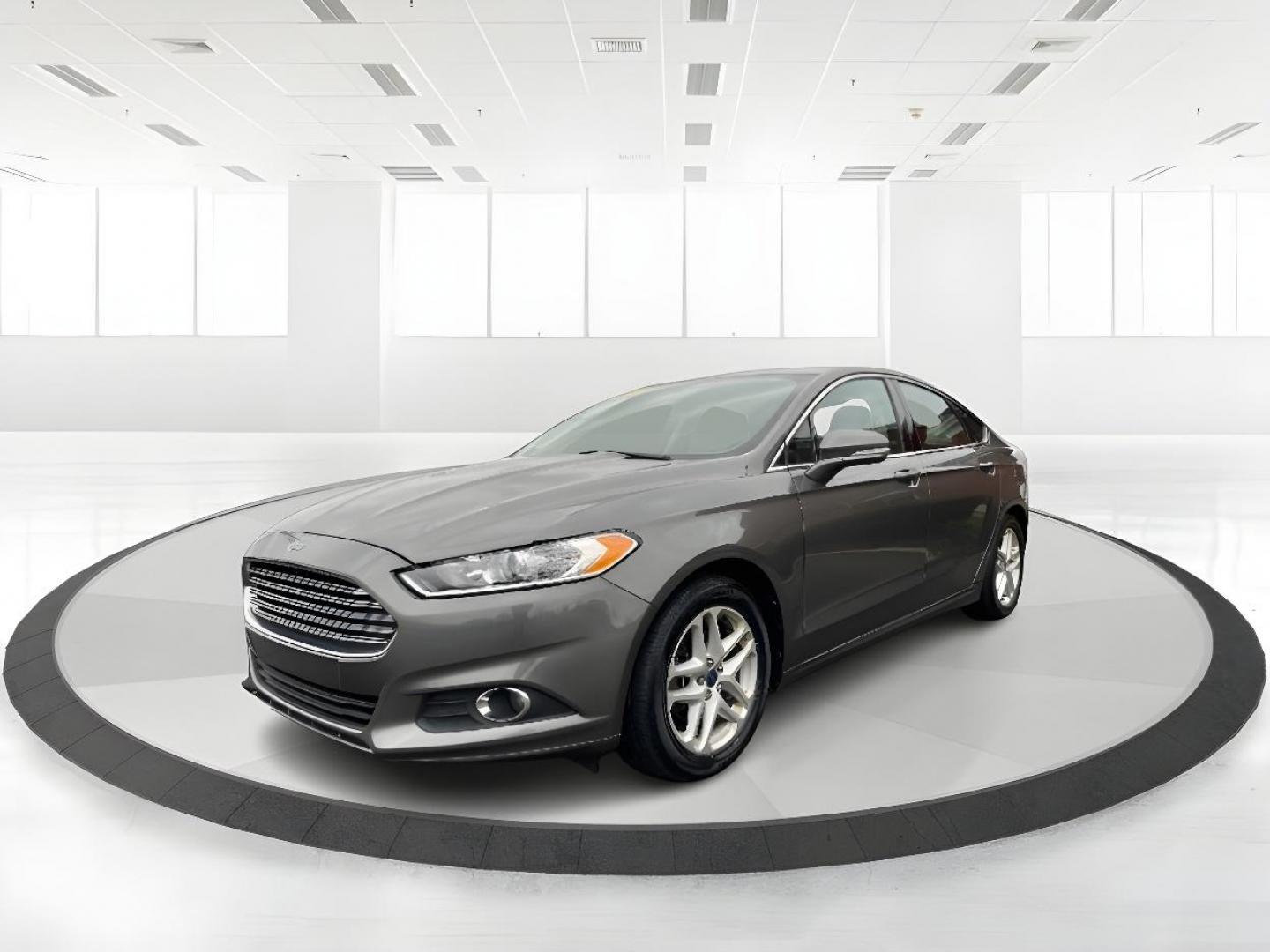 2014 Sterling Gray Ford Fusion (3FA6P0HD5ER) with an 1.5L L4 DOHC 16V engine, located at 401 Woodman Dr, Riverside, OH, 45431, (937) 908-9800, 39.760899, -84.123421 - Photo#2