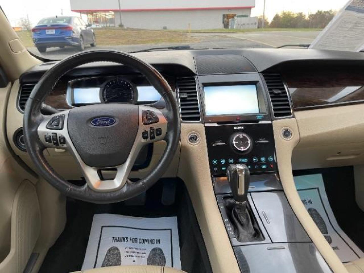 2014 Deep Impact Blue Metallic Ford Taurus Limited AWD (1FAHP2J86EG) with an 3.5L V6 DOHC 24V engine, 6-Speed Automatic transmission, located at 1230 East Main St, Xenia, OH, 45385, (937) 908-9800, 39.688026, -83.910172 - Photo#7