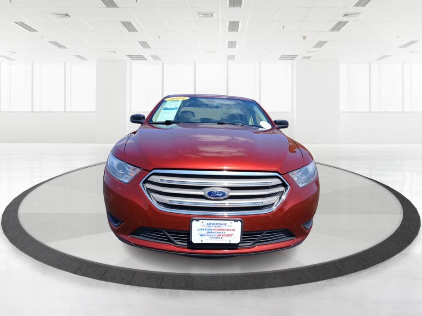 2014 Sunset Metallic Ford Taurus SE FWD (1FAHP2D88EG) with an 3.5L V6 DOHC 24V engine, 6-Speed Automatic transmission, located at 880 E. National Road, Vandalia, OH, 45377, (937) 908-9800, 39.891918, -84.183594 - Photo#6