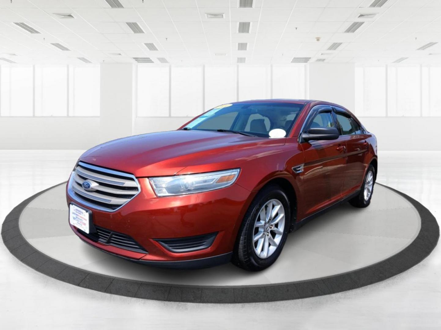 2014 Sunset Metallic Ford Taurus SE FWD (1FAHP2D88EG) with an 3.5L V6 DOHC 24V engine, 6-Speed Automatic transmission, located at 880 E. National Road, Vandalia, OH, 45377, (937) 908-9800, 39.891918, -84.183594 - Photo#7