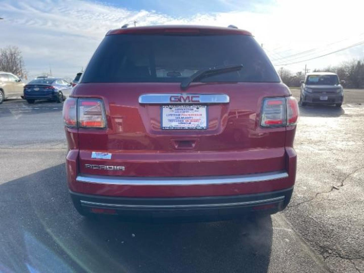 2014 Crystal Red Tintcoat GMC Acadia SLT-1 FWD (1GKKRRKDXEJ) with an 3.6L V6 DOHC 24V engine, 6-Speed Automatic transmission, located at 1951 S Dayton Lakeview Rd., New Carlisle, OH, 45344, (937) 908-9800, 39.890999, -84.050255 - Photo#5