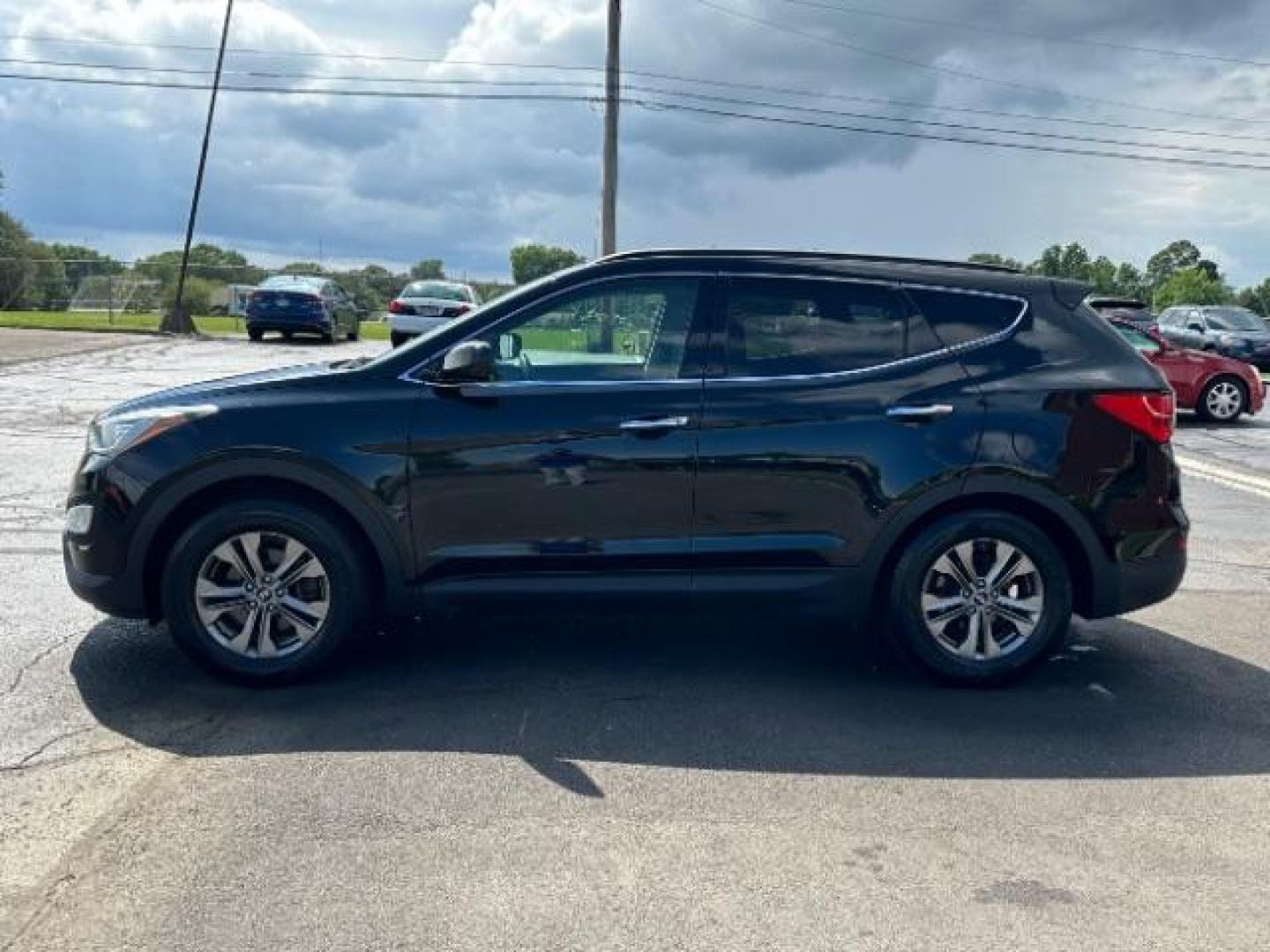 2014 Twilight Black Hyundai Santa Fe Sport 2.4 FWD (5XYZU3LB4EG) with an 2.4L L4 DOHC 16V engine, 6-Speed Automatic transmission, located at 401 Woodman Dr, Riverside, OH, 45431, (937) 908-9800, 39.760899, -84.123421 - Photo#3