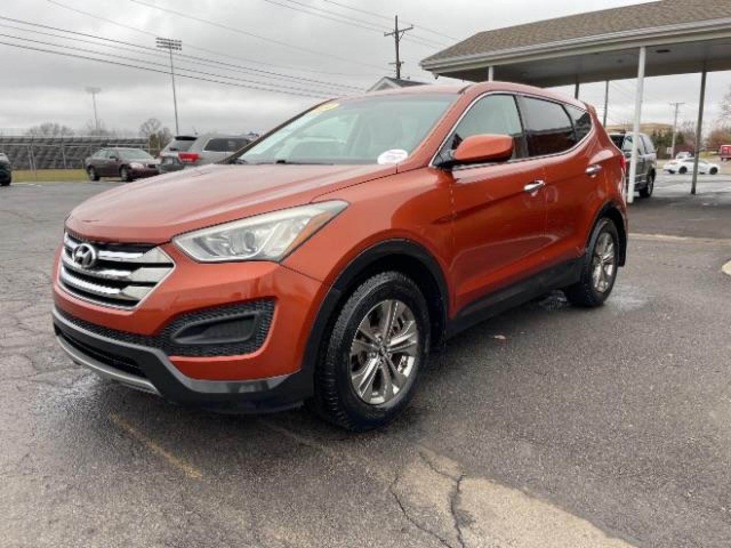 2014 Canyon Copper Hyundai Santa Fe Sport 2.4 FWD (5XYZT3LB1EG) with an 2.4L L4 DOHC 16V engine, 6-Speed Automatic transmission, located at 1184 Kauffman Ave, Fairborn, OH, 45324, (937) 908-9800, 39.807072, -84.030914 - Photo#1