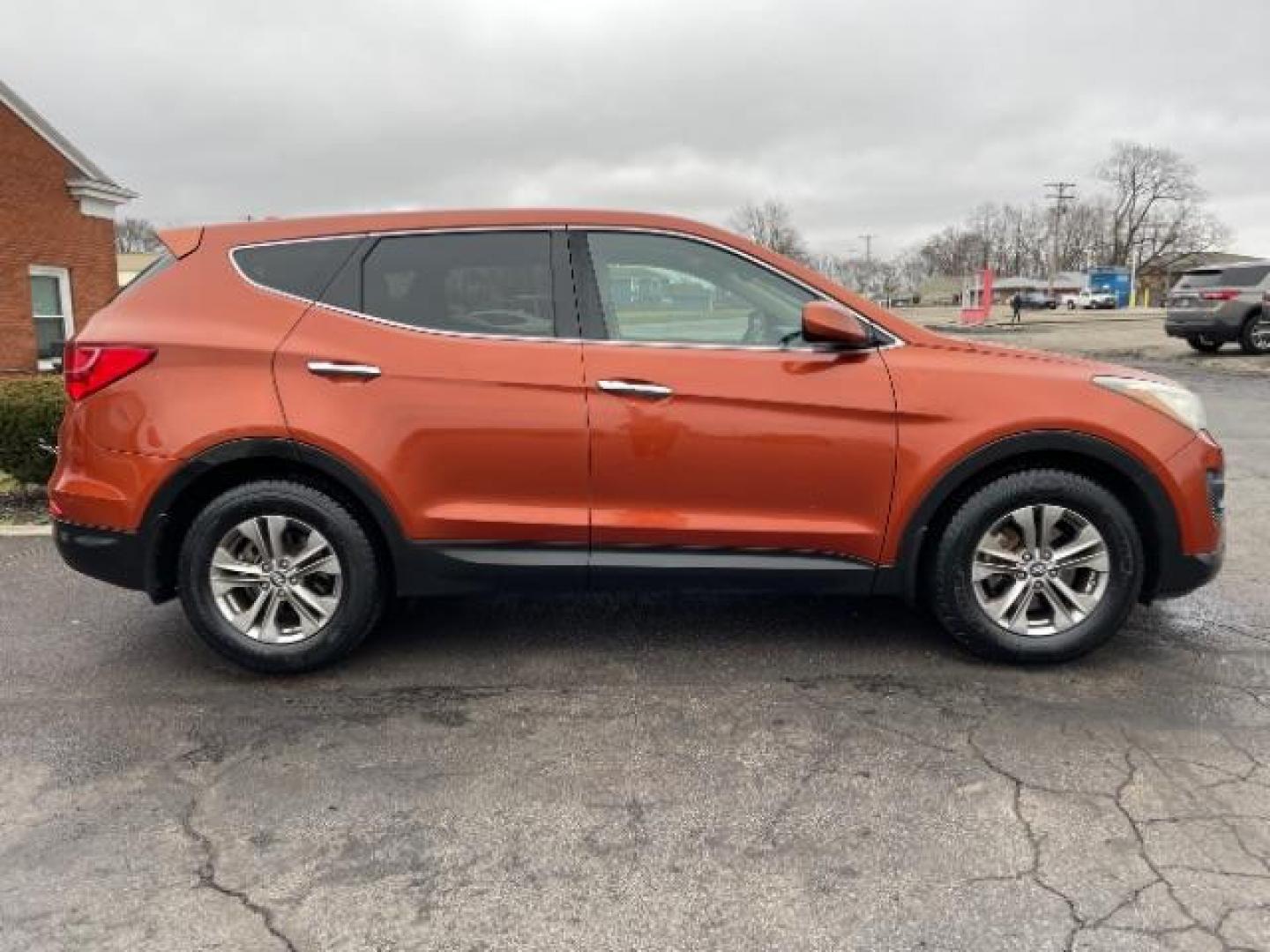 2014 Canyon Copper Hyundai Santa Fe Sport 2.4 FWD (5XYZT3LB1EG) with an 2.4L L4 DOHC 16V engine, 6-Speed Automatic transmission, located at 1184 Kauffman Ave, Fairborn, OH, 45324, (937) 908-9800, 39.807072, -84.030914 - Photo#3