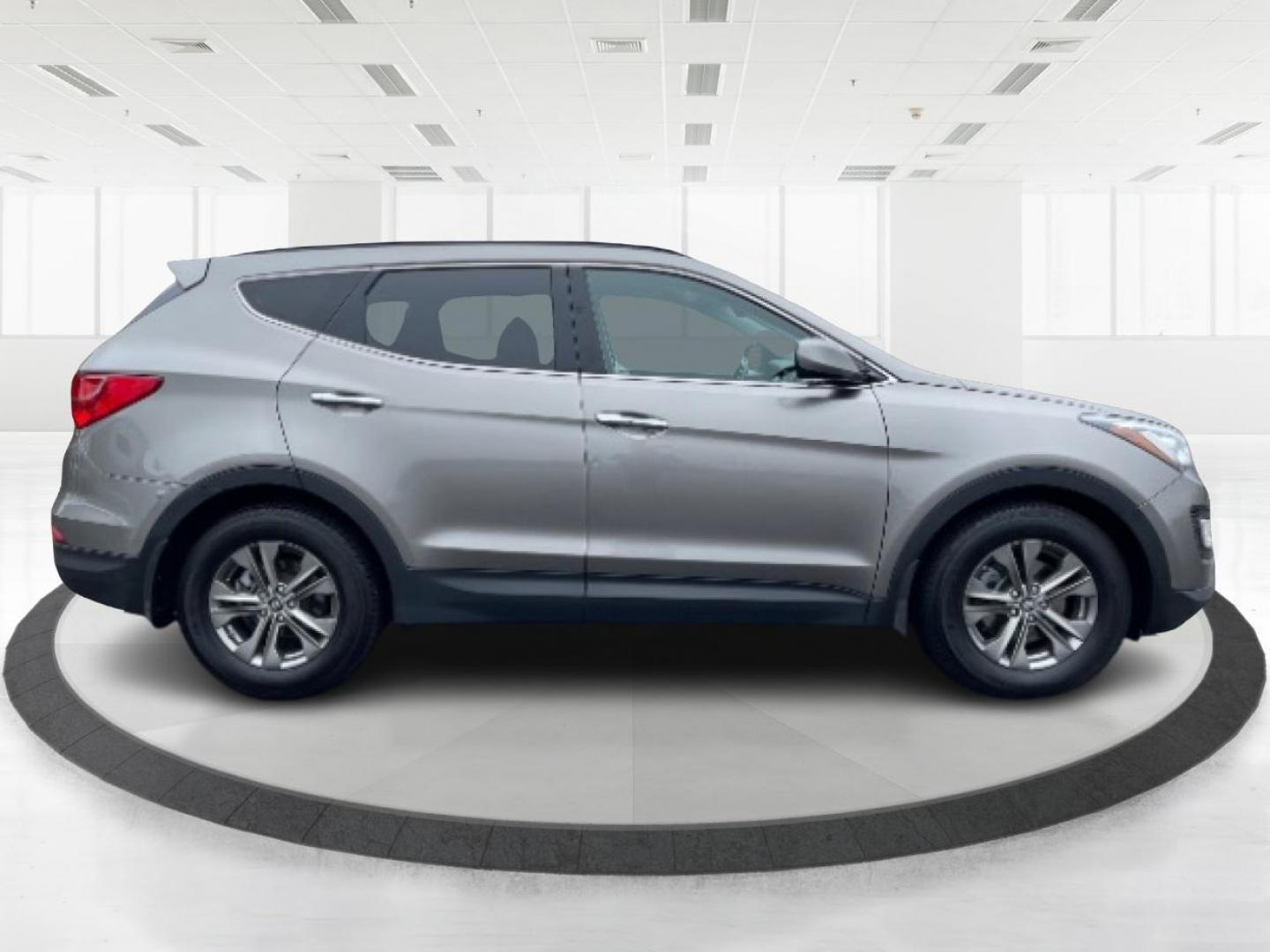 2014 Mineral Gray Hyundai Santa Fe (5XYZU3LB3EG) with an 2.4L L4 DOHC 16V engine, 6-Speed Automatic transmission, located at 1099 N County Rd 25A , Troy, OH, 45373, (937) 908-9800, 40.057079, -84.212883 - Photo#1