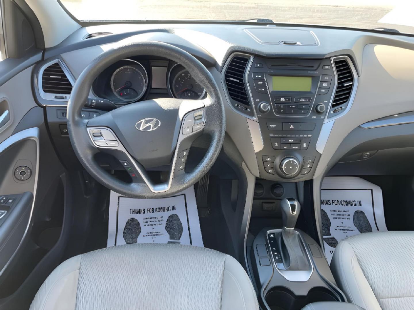 2014 Moonstone Silver Hyundai Santa Fe (5XYZTDLB2EG) with an 2.4L L4 DOHC 16V engine, 6-Speed Automatic transmission, located at 1099 N County Rd 25A , Troy, OH, 45373, (937) 908-9800, 40.057079, -84.212883 - Photo#6