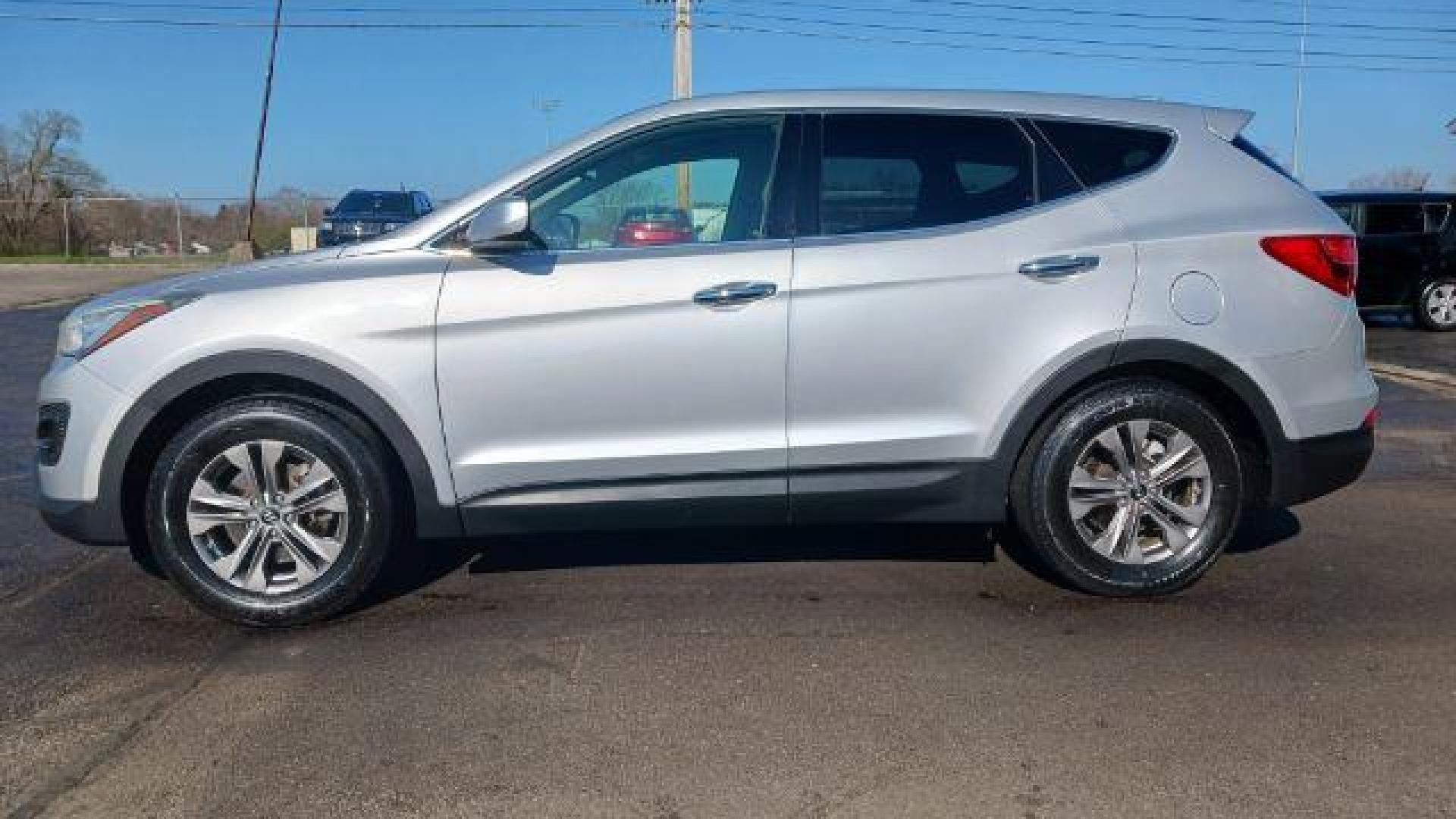 2014 Hyundai Santa Fe Sport 2.4 FWD (5XYZT3LB5EG) with an 2.4L L4 DOHC 16V engine, 6-Speed Automatic transmission, located at 8750 N County Rd 25A, Piqua, OH, 45356, (937) 908-9800, 40.164391, -84.232513 - 2014 Hyundai Santa Fe Sport 2.4 FWD - Photo#3