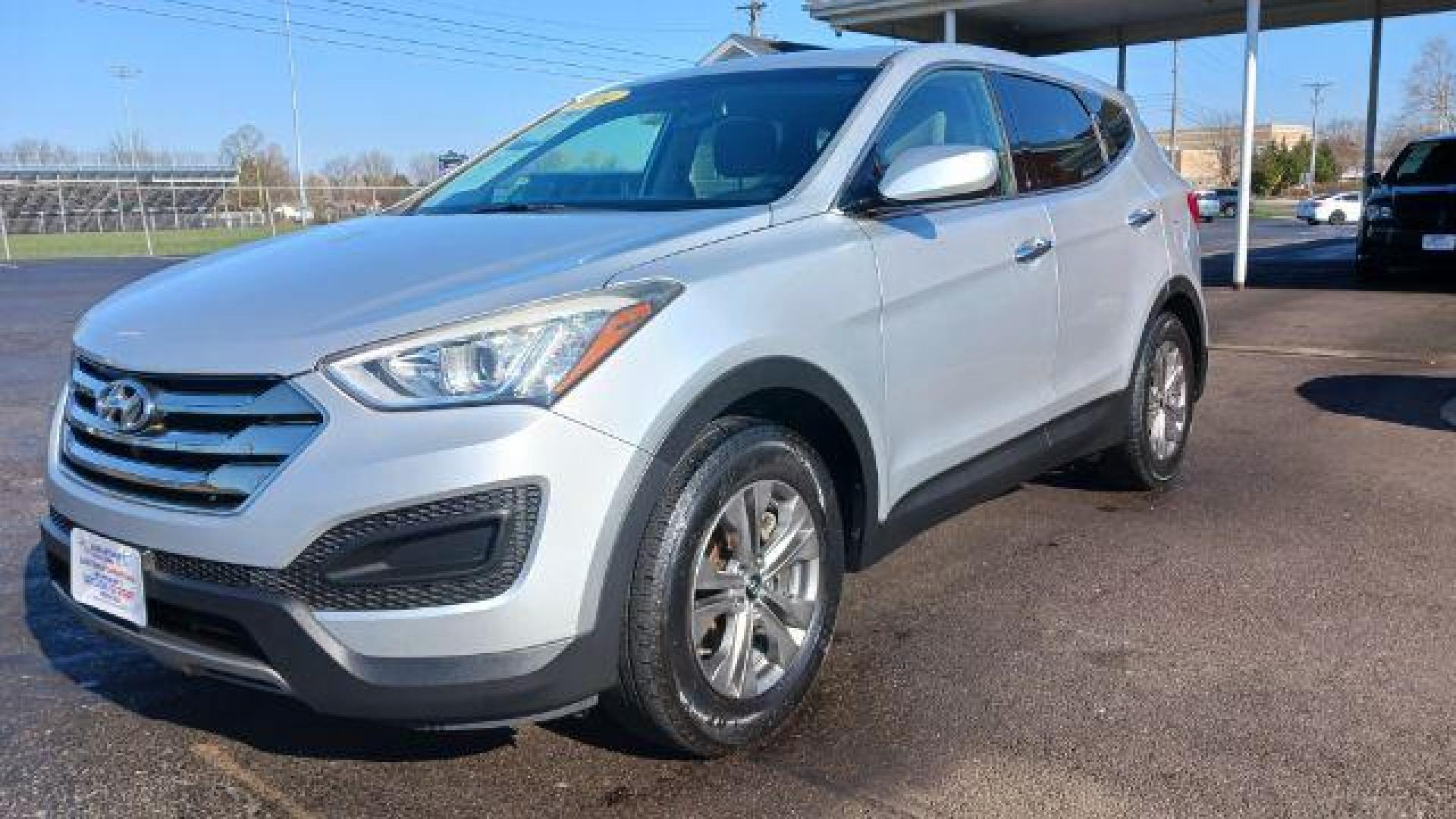 2014 Moonstone Silver Hyundai Santa Fe Sport 2.4 FWD (5XYZT3LB5EG) with an 2.4L L4 DOHC 16V engine, 6-Speed Automatic transmission, located at 401 Woodman Dr, Riverside, OH, 45431, (937) 908-9800, 39.760899, -84.123421 - Photo#4