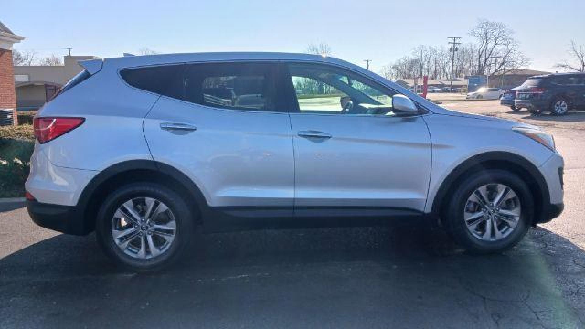 2014 Moonstone Silver Hyundai Santa Fe Sport 2.4 FWD (5XYZT3LB5EG) with an 2.4L L4 DOHC 16V engine, 6-Speed Automatic transmission, located at 401 Woodman Dr, Riverside, OH, 45431, (937) 908-9800, 39.760899, -84.123421 - Photo#8