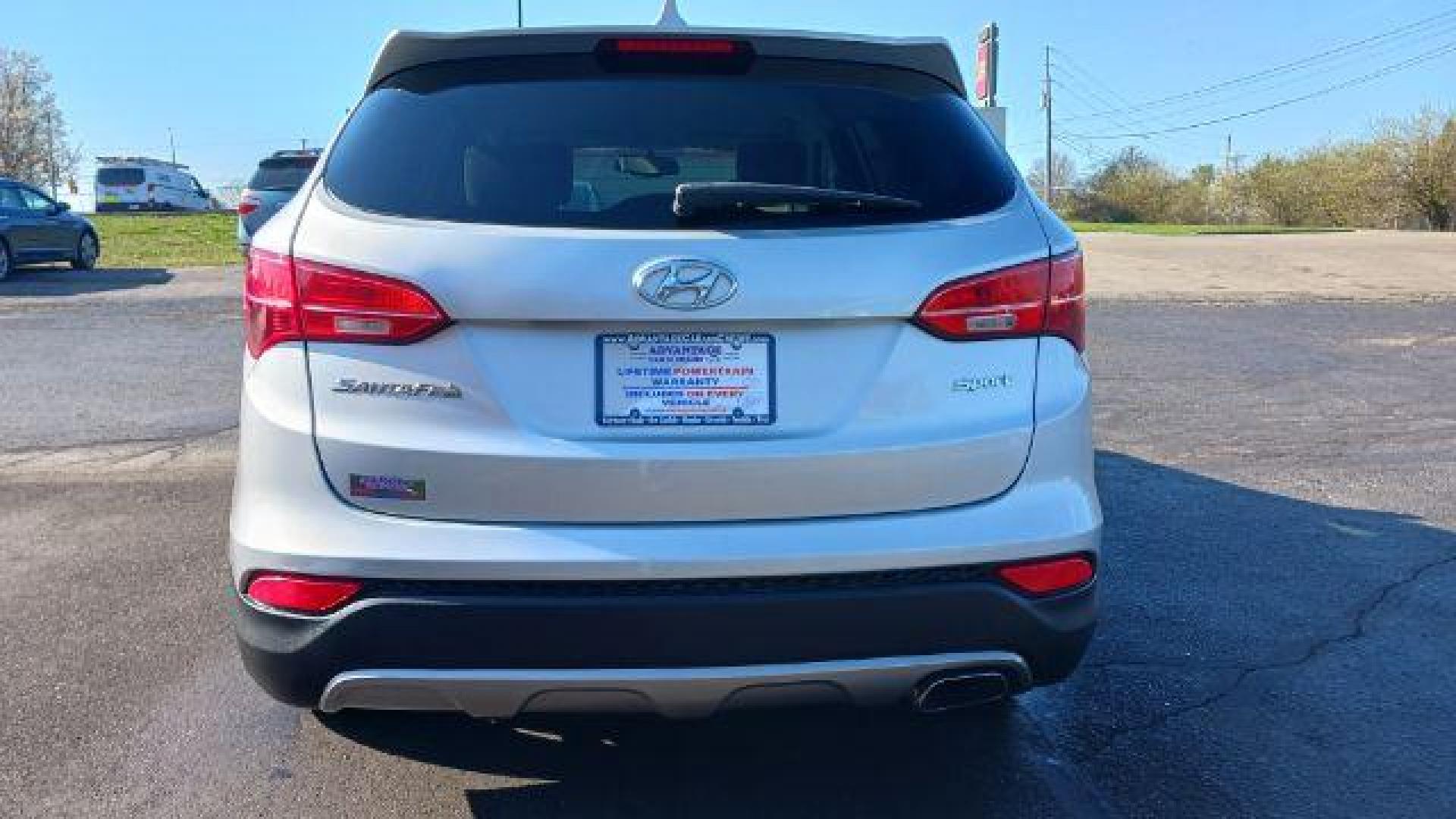 2014 Moonstone Silver Hyundai Santa Fe Sport 2.4 FWD (5XYZT3LB5EG) with an 2.4L L4 DOHC 16V engine, 6-Speed Automatic transmission, located at 401 Woodman Dr, Riverside, OH, 45431, (937) 908-9800, 39.760899, -84.123421 - Photo#10