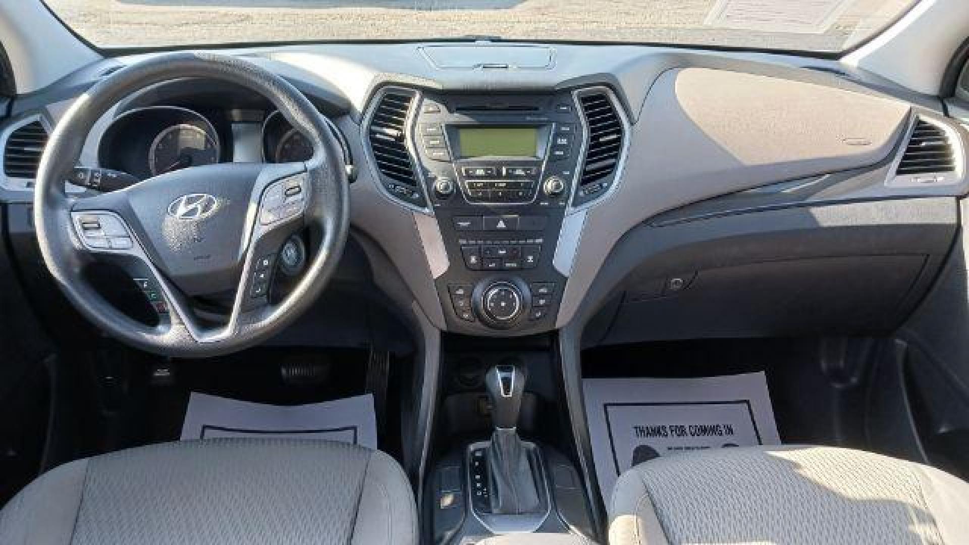 2014 Moonstone Silver Hyundai Santa Fe Sport 2.4 FWD (5XYZT3LB5EG) with an 2.4L L4 DOHC 16V engine, 6-Speed Automatic transmission, located at 401 Woodman Dr, Riverside, OH, 45431, (937) 908-9800, 39.760899, -84.123421 - Photo#14