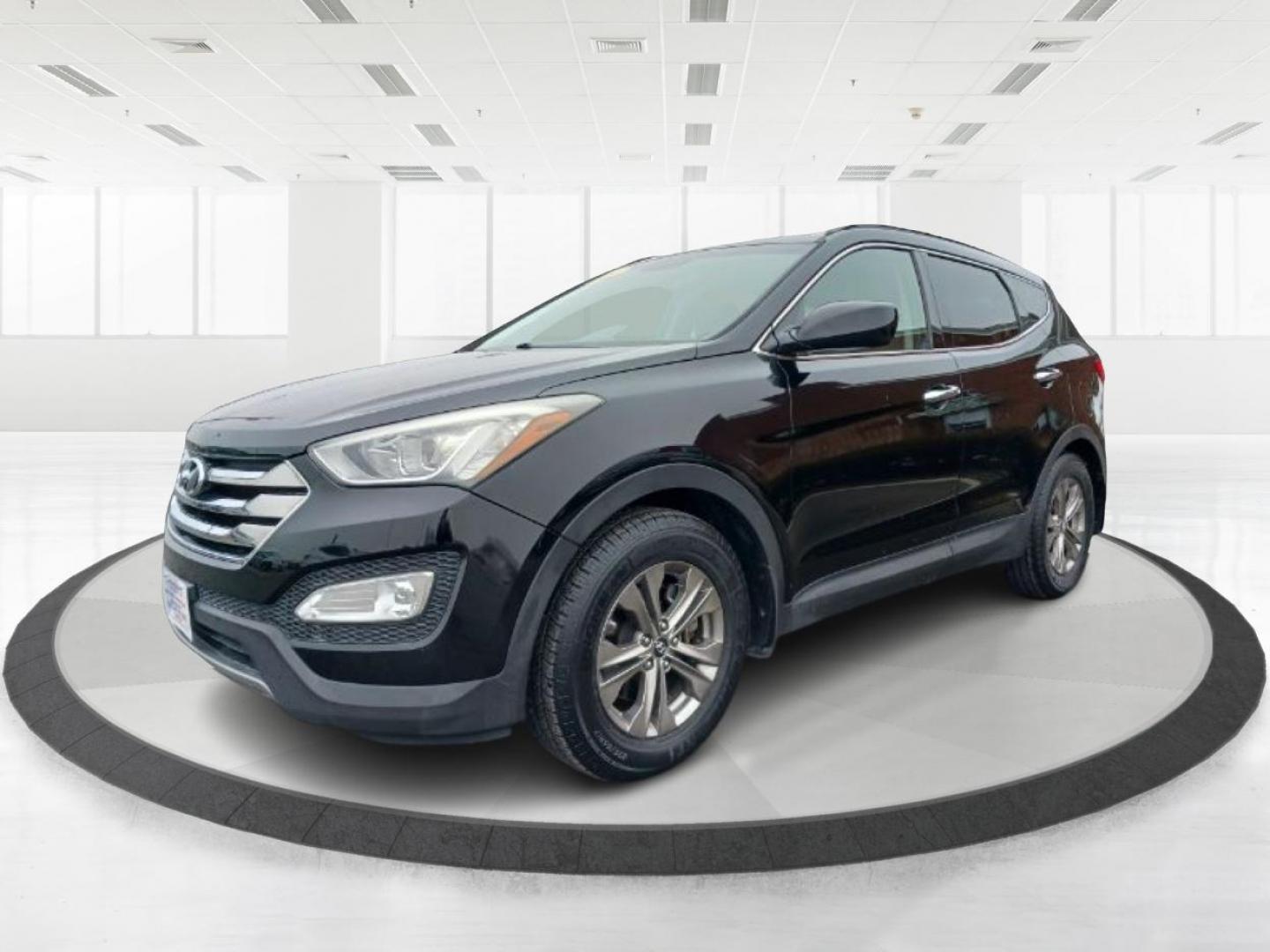 2014 Twilight Black Hyundai Santa Fe (5XYZU3LB5EG) with an 2.4L L4 DOHC 16V engine, 6-Speed Automatic transmission, located at 4508 South Dixie Dr, Moraine, OH, 45439, (937) 908-9800, 39.689976, -84.218452 - Photo#5