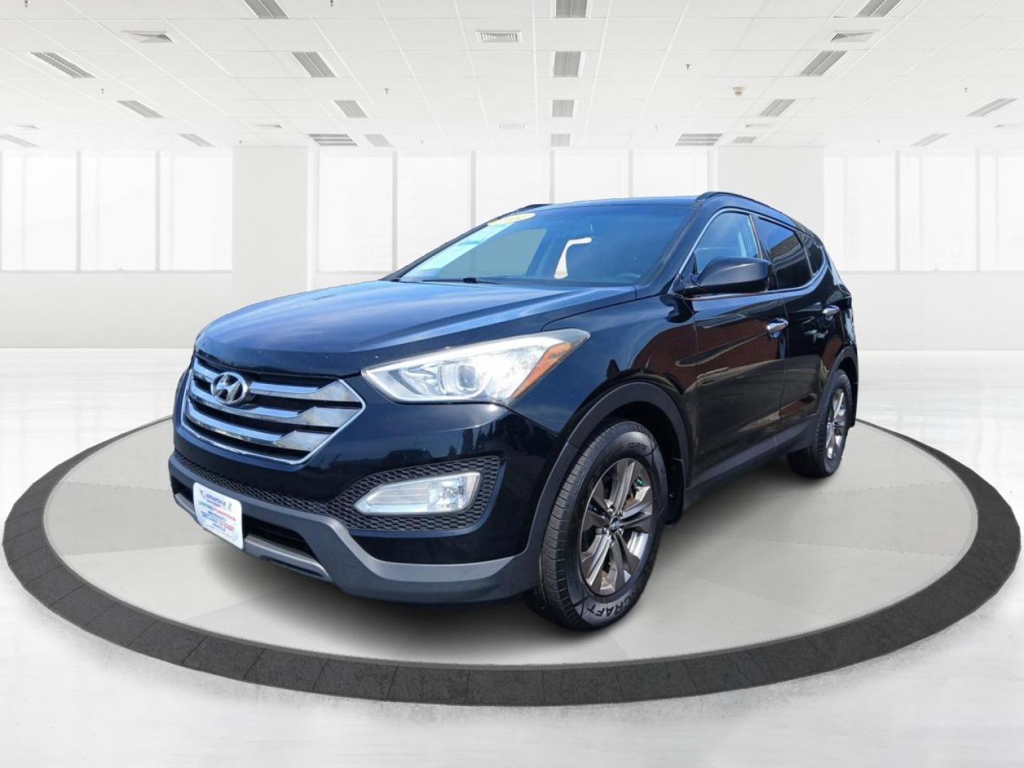 2014 Twilight Black Hyundai Santa Fe Sport 2.4 AWD (5XYZUDLB1EG) with an 2.4L L4 DOHC 16V engine, 6-Speed Automatic transmission, located at 880 E. National Road, Vandalia, OH, 45377, (937) 908-9800, 39.891918, -84.183594 - Photo#7