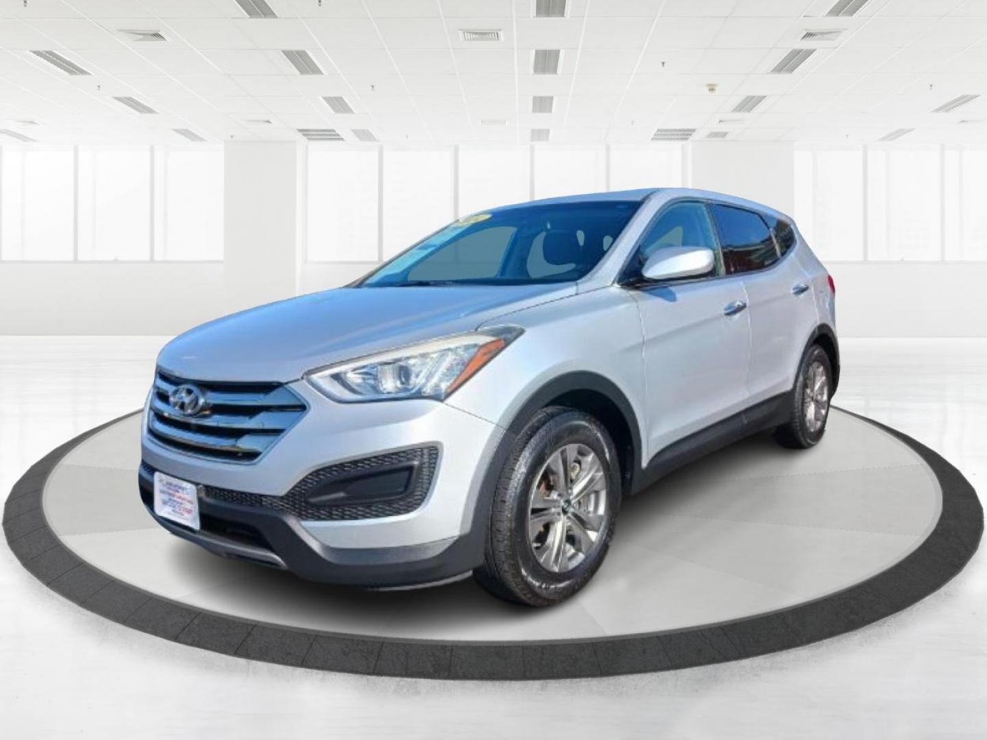 2014 Moonstone Silver Hyundai Santa Fe (5XYZT3LB5EG) with an 2.4L L4 DOHC 16V engine, 6-Speed Automatic transmission, located at 401 Woodman Dr, Riverside, OH, 45431, (937) 908-9800, 39.760899, -84.123421 - Photo#4