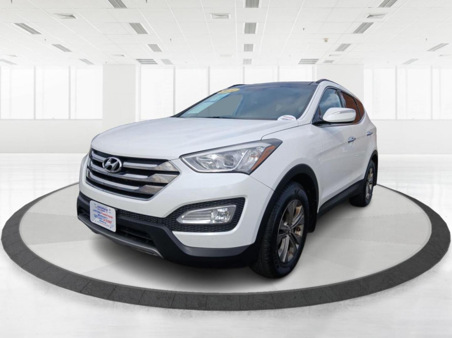 2014 Hyundai Santa Fe Sport 2.4 AWD (5XYZUDLB5EG) with an 2.4L L4 DOHC 16V engine, 6-Speed Automatic transmission, located at 1230 East Main St, Xenia, OH, 45385, (937) 908-9800, 39.688026, -83.910172 - 2014 Hyundai Santa Fe Sport 2.4 AWD - Photo#7