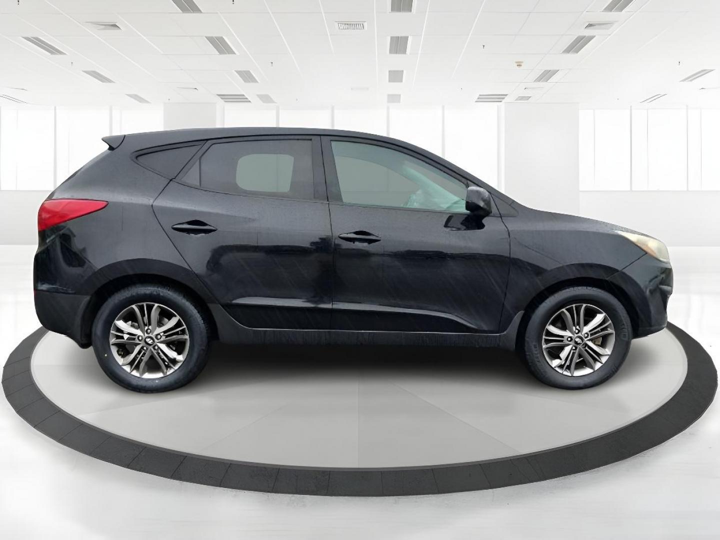 2014 Black Hyundai Tucson GL Auto AWD (KM8JTCAF0EU) with an 2.0L L4 DOHC 16V engine, 6-Speed Automatic transmission, located at 4508 South Dixie Dr, Moraine, OH, 45439, (937) 908-9800, 39.689976, -84.218452 - Photo#1