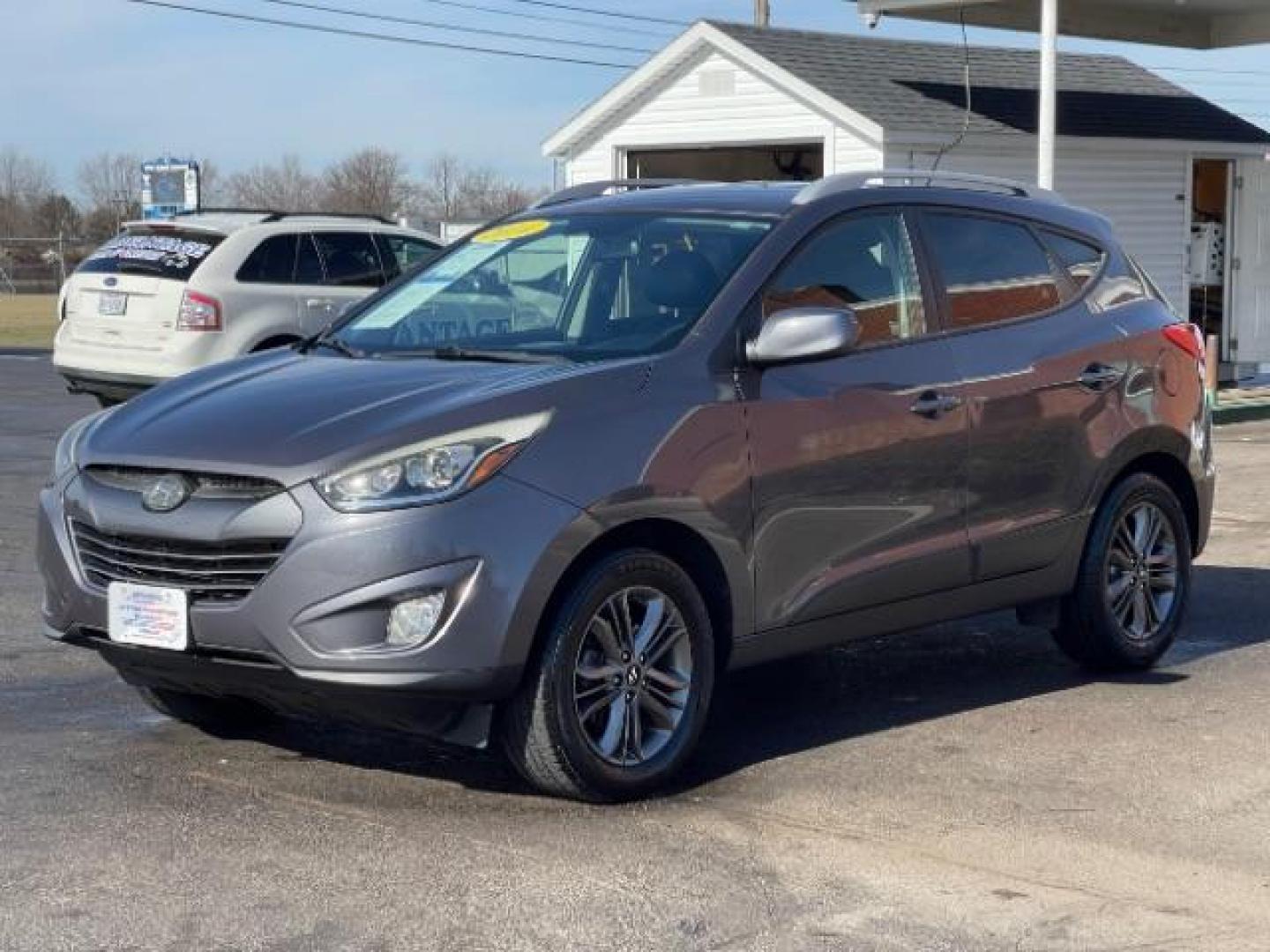 2014 Shadow Grey Hyundai Tucson GLS 2WD (KM8JU3AG9EU) with an 2.4L L4 DOHC 16V engine, 6-Speed Automatic transmission, located at 4508 South Dixie Dr, Moraine, OH, 45439, (937) 908-9800, 39.689976, -84.218452 - Photo#1