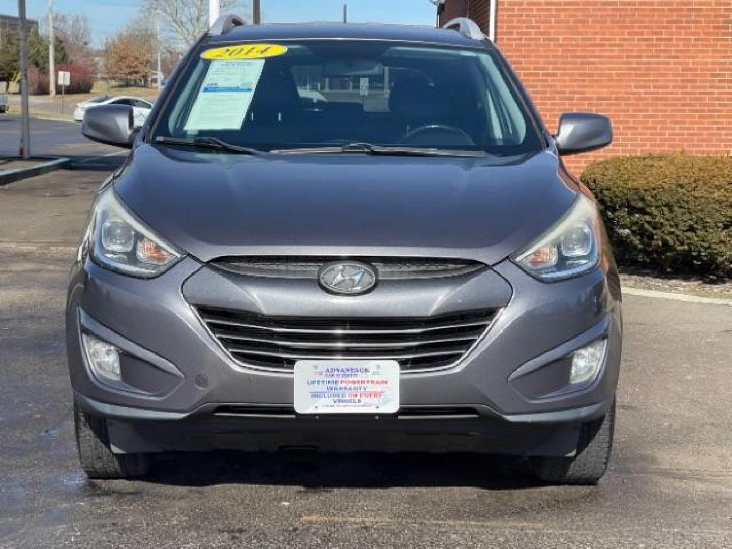 2014 Shadow Grey Hyundai Tucson GLS 2WD (KM8JU3AG9EU) with an 2.4L L4 DOHC 16V engine, 6-Speed Automatic transmission, located at 4508 South Dixie Dr, Moraine, OH, 45439, (937) 908-9800, 39.689976, -84.218452 - Photo#2