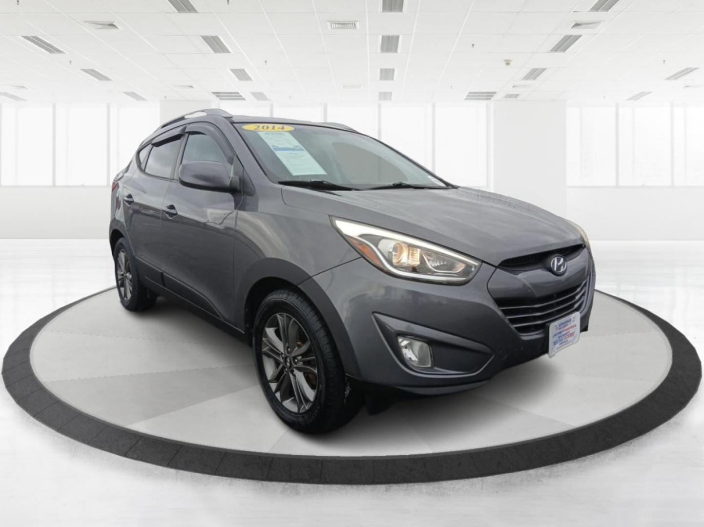 2014 Hyundai Tucson GLS AWD (KM8JUCAGXEU) with an 2.4L L4 DOHC 16V engine, 6-Speed Automatic transmission, located at 1951 S Dayton Lakeview Rd., New Carlisle, OH, 45344, (937) 908-9800, 39.890999, -84.050255 - 2014 Hyundai Tucson GLS AWD - Photo#0