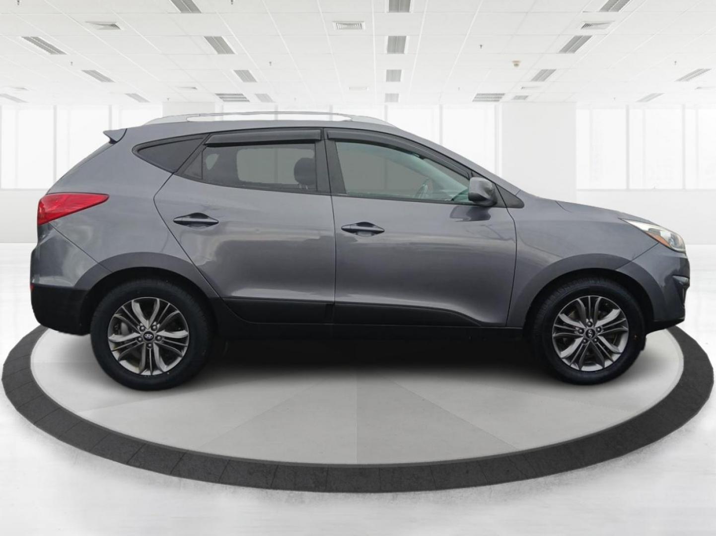 2014 Hyundai Tucson GLS AWD (KM8JUCAGXEU) with an 2.4L L4 DOHC 16V engine, 6-Speed Automatic transmission, located at 1951 S Dayton Lakeview Rd., New Carlisle, OH, 45344, (937) 908-9800, 39.890999, -84.050255 - 2014 Hyundai Tucson GLS AWD - Photo#1