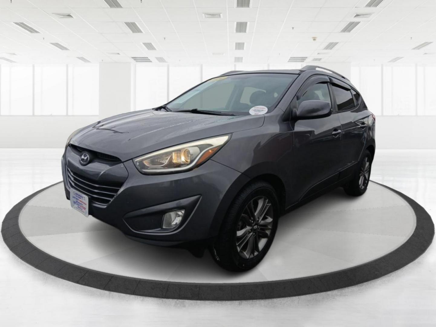 2014 Hyundai Tucson GLS AWD (KM8JUCAGXEU) with an 2.4L L4 DOHC 16V engine, 6-Speed Automatic transmission, located at 1951 S Dayton Lakeview Rd., New Carlisle, OH, 45344, (937) 908-9800, 39.890999, -84.050255 - 2014 Hyundai Tucson GLS AWD - Photo#7