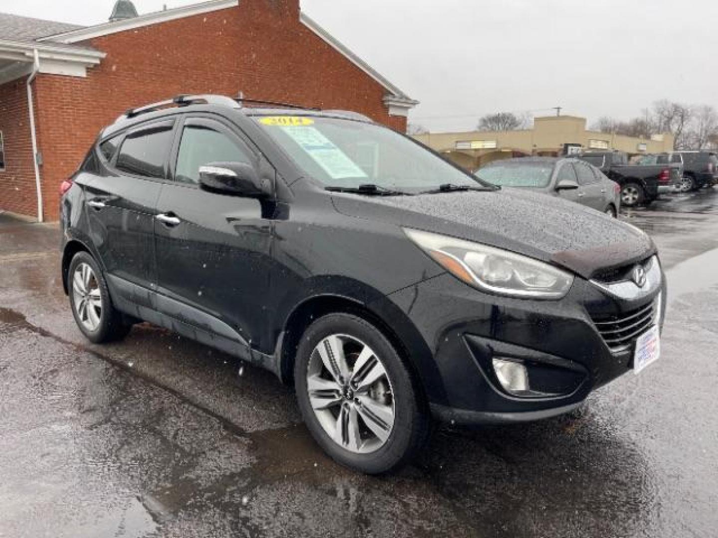 2014 Ash Black Hyundai Tucson GLS AWD (KM8JUCAG3EU) with an 2.4L L4 DOHC 16V engine, 6-Speed Automatic transmission, located at 1099 N County Rd 25A , Troy, OH, 45373, (937) 908-9800, 40.057079, -84.212883 - Photo#0