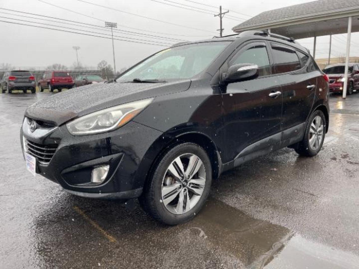 2014 Ash Black Hyundai Tucson GLS AWD (KM8JUCAG3EU) with an 2.4L L4 DOHC 16V engine, 6-Speed Automatic transmission, located at 1099 N County Rd 25A , Troy, OH, 45373, (937) 908-9800, 40.057079, -84.212883 - Photo#1